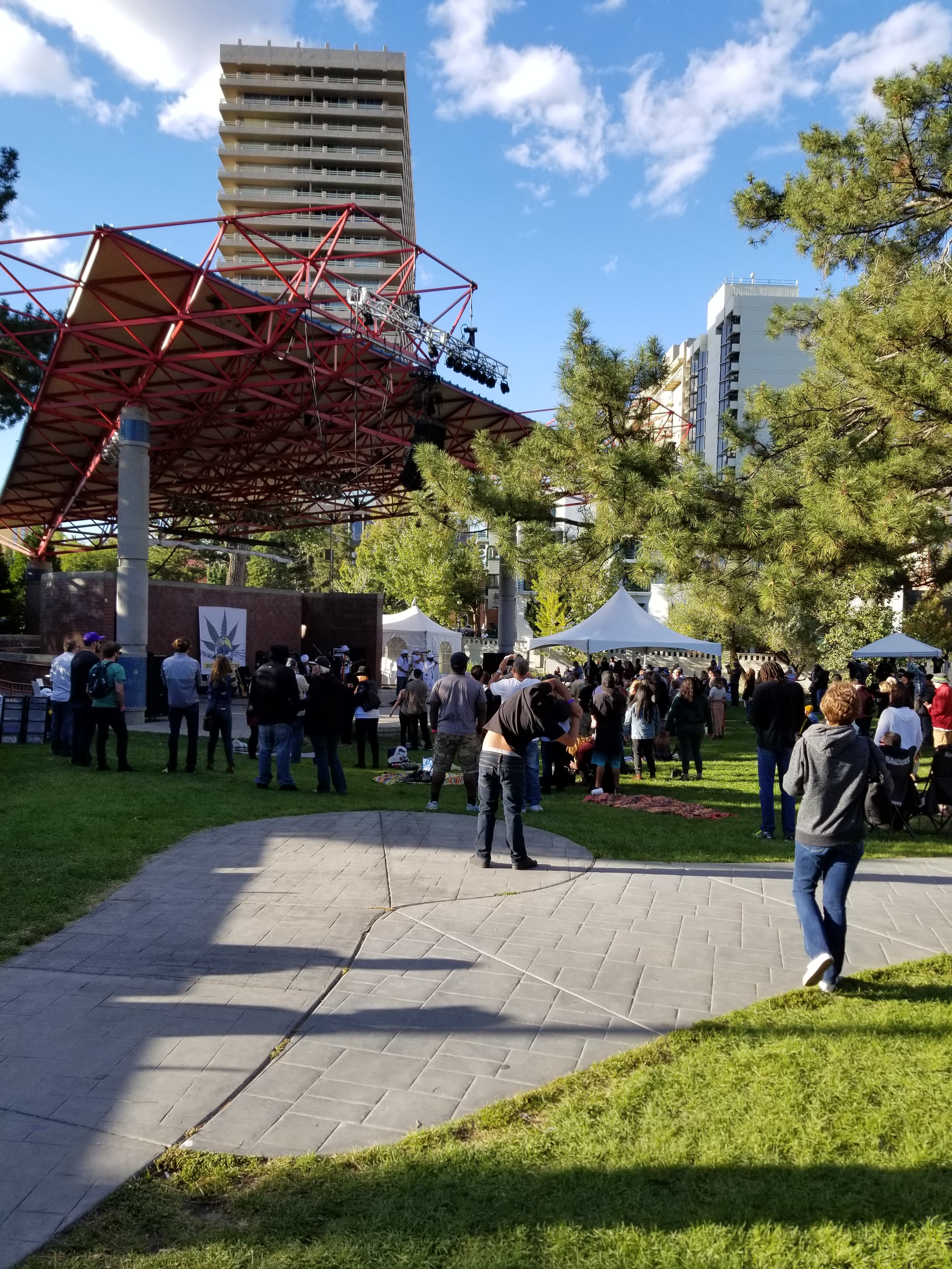 Crowd and red outdoor stage structure at Bud & Brew Music Festival