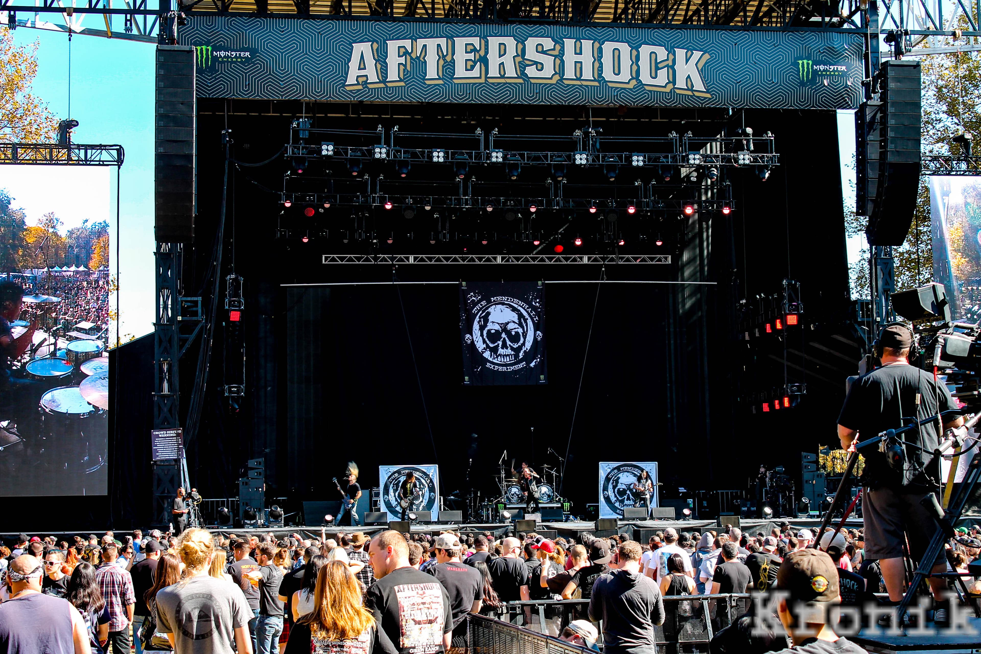 Band performing on Aftershock Festival main stage with full crowd and Kronik watermark